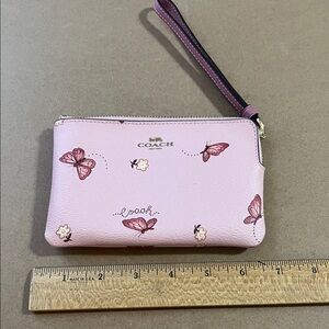 Coach Light Pink Wristlet with Butterfly Accents Excellent Condition